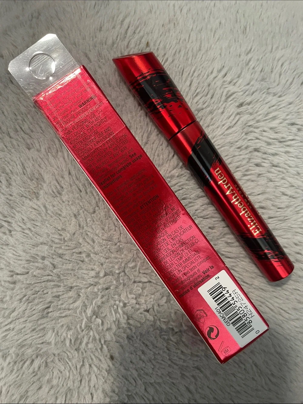 Elizabeth Arden Red Metallic Mascara Tube with Black Brushstroke Accents